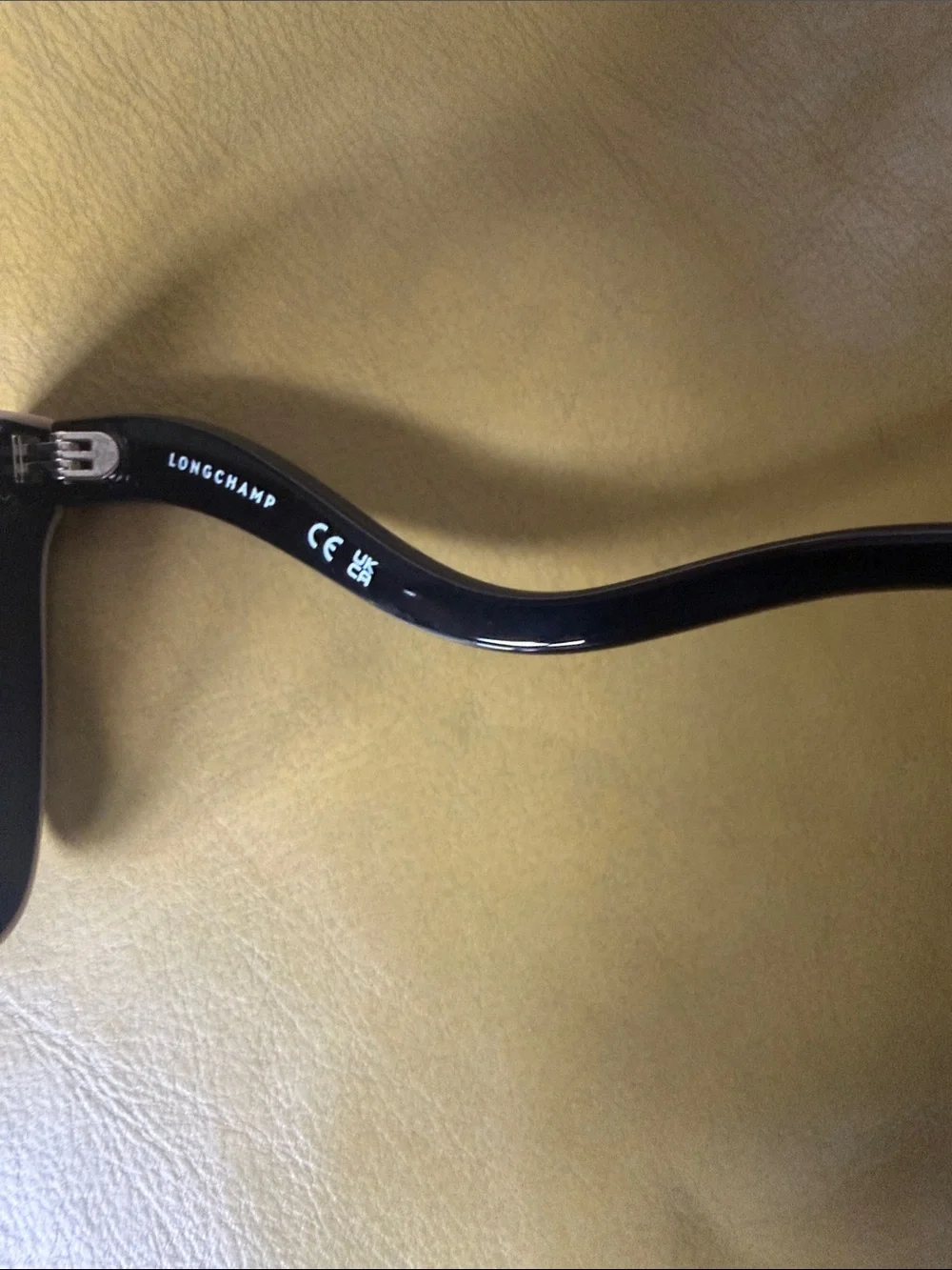 Longchamp New Style Black Frame Sunglasses with Brown Gradient Lenses
